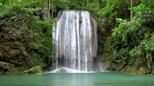 Erawan waterfall level three in National Park, famous tourist destination in Kanchanaburi, Thailand - Slow motion