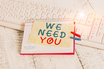 Conceptual hand writing showing We Need You. Concept meaning Company wants to hire Vacancy Looking for talents Job employment notebook reminder clothespin with pinned sheet light wooden