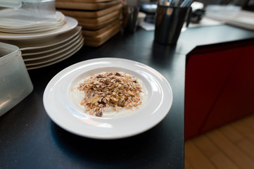 homemade muesli on white dish