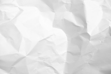 White crumpled paper texture background.