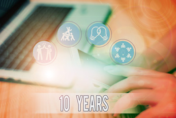Handwriting text writing 10 Years. Conceptual photo Remembering or honoring special day for being...