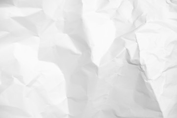 Obraz premium White crumpled paper texture background.