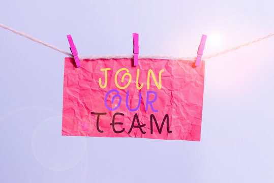 Handwriting text writing Join Our Team. Conceptual photo Allied Associate Work with us New Employee Hired Enlist Clothesline clothespin rectangle shaped paper reminder white wood desk
