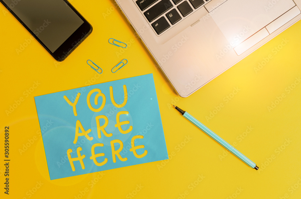 Aufkleber conceptual hand writing showing you are here. concept meaning this is your location reference point 