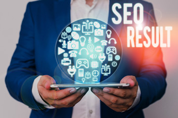 Writing note showing Seo Result. Business concept for the list created by search engines in response to a query