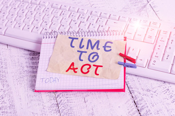 Conceptual hand writing showing Time To Act. Concept meaning Do it now Response Immediately Something need to be done notebook reminder clothespin with pinned sheet light wooden