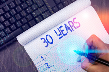 Writing note showing 30 Years. Business concept for Remembering or honoring special day for being...