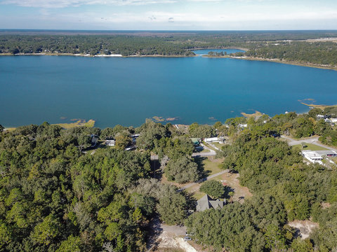 Aerial view of a lake in Keystone Heights Florida. Flying a drone over the lake. 