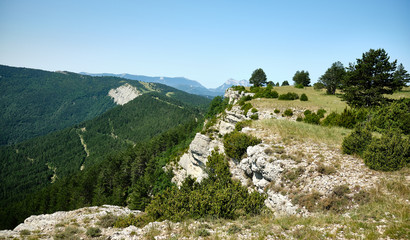 Fototapeta na wymiar Clifftop view from the footpath on the Col du Royet in the Drome region of France