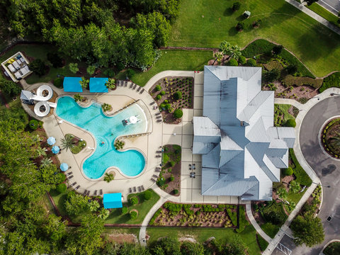 Aerial View Of Community Pool And Clubhouse