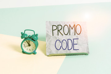Handwriting text writing Promo Code. Conceptual photo digital numbers that give you good discount on certain product Mini size alarm clock beside a Paper sheet placed tilted on pastel backdrop
