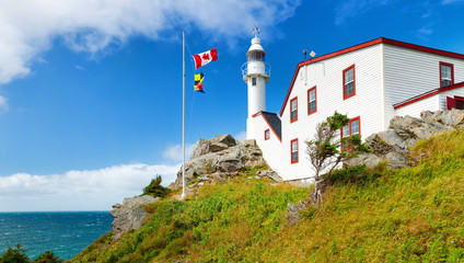 Panorama of Lobster Cove Head Lighthouse in Gros Morne National Park, Newfoundland - obrazy, fototapety, plakaty