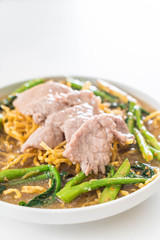 crispy egg noodles with chinese broccoli and pork