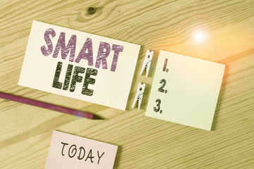 Conceptual hand writing showing Smart Life. Concept meaning approach conceptualized from a frame of prevention and lifestyles Colored crumpled papers wooden floor background clothespin
