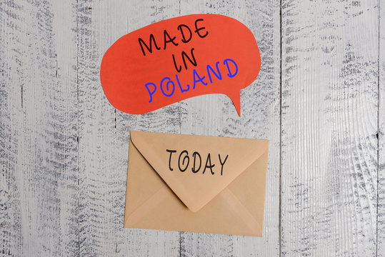 Handwriting text writing Made In Poland. Conceptual photo A product or something that is analysisufactured in Poland Front view closed envelop speech bubble lying wooden vintage background