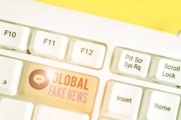 Conceptual hand writing showing Global Fake News. Concept meaning False information Journalism Lies...