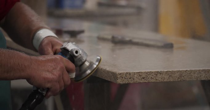 Slow Motion Stone Cutter Sanding Granite Counter Top Slab With Water.