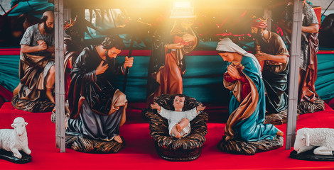  Traditional Christmas scenes and sacred light shining down for use in the illustration of the Nativity scene with the baby Jesus, including Jesus, Mary, Joseph, the sheep and the magus.