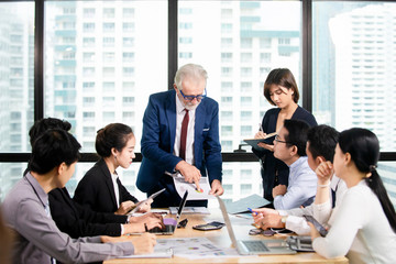 Successful Business team Meeting at meeting room in office, businessman  owner holding papers coworkers making great business discussion ,Teamwork busines success concept
