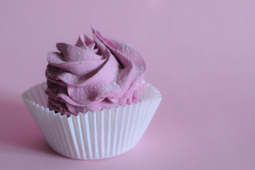 Homemade marshmallow berry zephyr on pink background