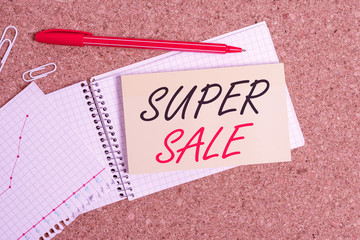 Handwriting text Super Sale. Conceptual photo offering exceptional discounts on selected products and services Desk notebook paper office cardboard paperboard study supplies table chart
