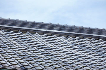 Fototapeta na wymiar Traditional Japanese building, roof tiles