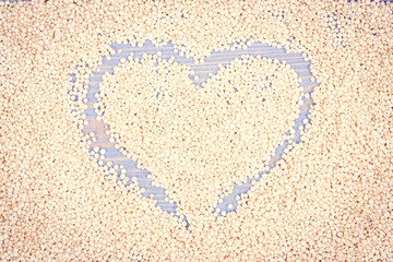 Vintage photo, Quinoa seeds containing natural minerals and vitamins and shape of heart