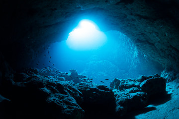 Rays of sunlight into the underwater cave