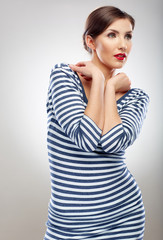 Naklejka premium Beautiful woman in striped dress.