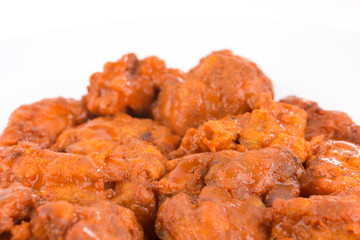 Boneless chicken wings with buffalo sauce and carrots