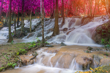 Waterfall scene at Pha Tad Waterfalls in rainforest  at the Khuean Srinagarindra National Park Kanchanaburi.