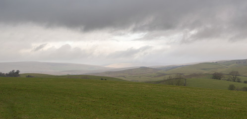 Rolling green hills near Pen-y-ghent in the Yorkshire Dales