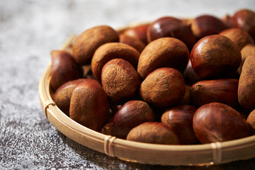 A lot of chestnuts in bamboo basket