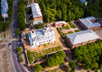 Holy Trinity Mariinsky Convent of city Yegorievsk from helicopter. Russia