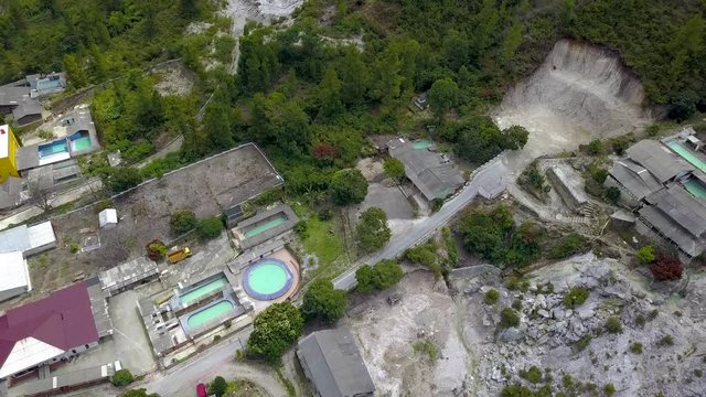 Aerial view of a public natural hot spring area known as Aek Rangat Pangururan located in Samosir Island, Lake Toba, Indonesia.