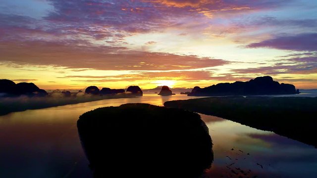 Aerial view drone shot of Beautiful light sunrise in the morning at Ban Sam Chong Tai Village phang-nga province thailand