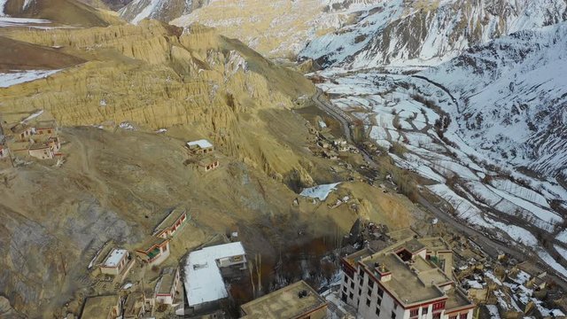 Aerial view of Lamayuru Gompa (monastery) in winter. It belongs to the Drikung Kagyu school of Tibetan Buddhism. Lamyauru is located in Ladakh on the Srinagar - Leh highway in an altitude of 3.510 m.