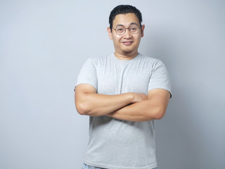 Young Funny Asian Man Smiling Happily