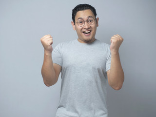 Funny Asian Man Shows Surprised Happy Expression