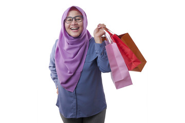 Happy Muslim Woman Bring Shopping Bags