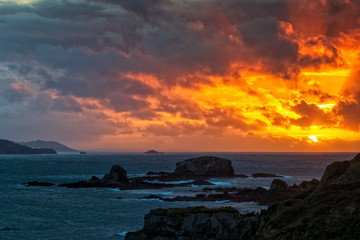 Dramatic Sky of Fire over Miranda Islands at the Mouth of Ares Estuary La Coruna Galicia