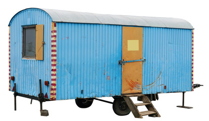 An old aged blue trailer  was once used to transport circus artists isolated © Aleksandr Volkov