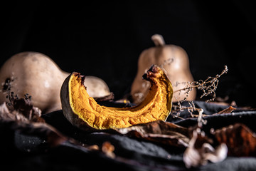 Baked pumpkin on a dark environment