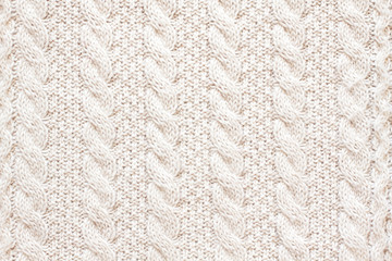 Cable knitting stitch pattern, soft woolen handmade knitted clothes texture. - obrazy, fototapety, plakaty