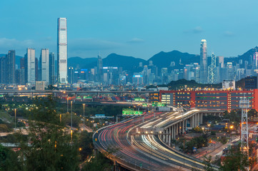 Skyline and highway of Hong Kong city at dusk