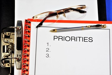 Priority plan in a folder-a concept that shows the importance, primacy, determines the order of...
