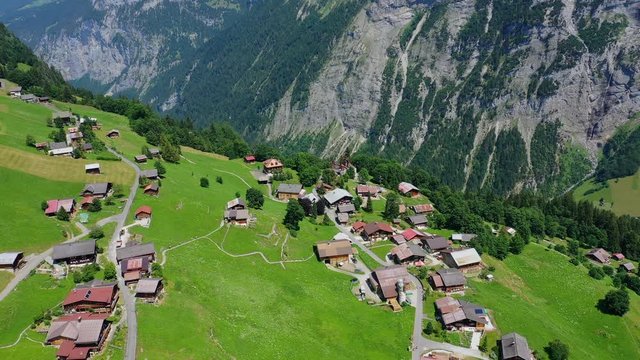 Small village of Gimmelwald in the Swiss mountains - Switzerland from above - aerial photography
