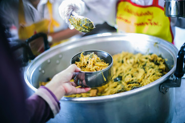 The beggars receive food from the help of the generous in society: the concept of hope and need for food