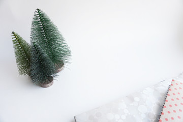 Three Christmas trees on white background.