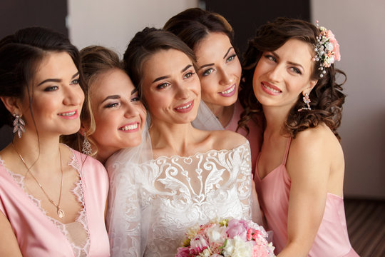 Wedding guests. Group portrait of bride and bridesmaids